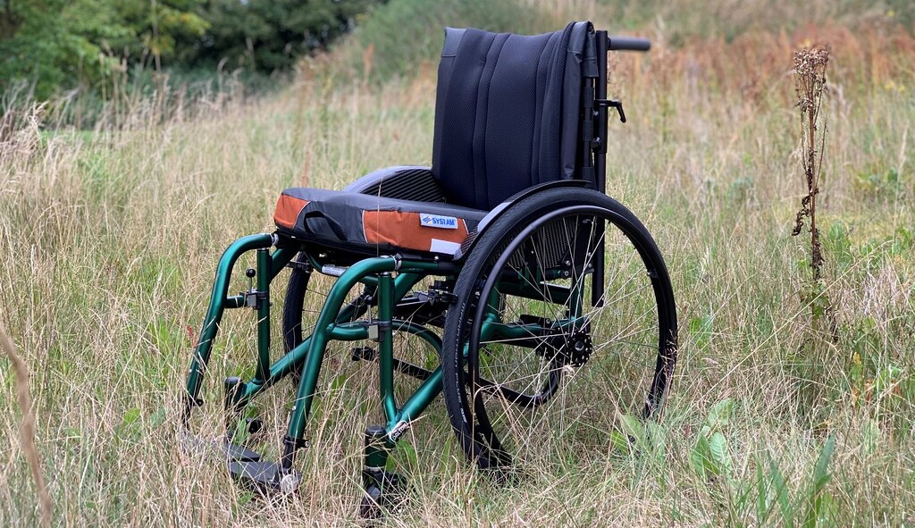 Dalton Wheelchair Anodised Green in grass