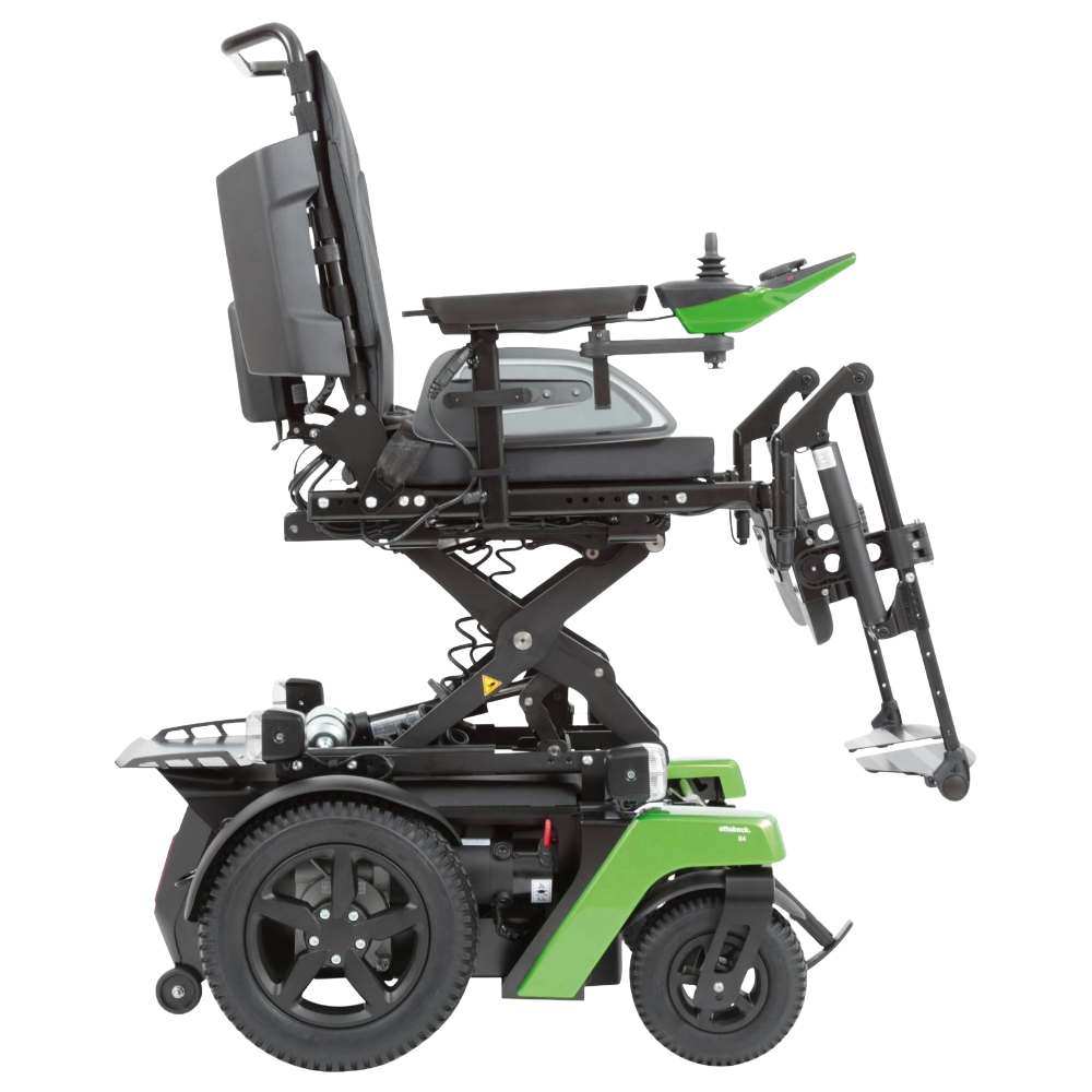 Isolated product view of the Ottobock Juvo B4 RWD powerchair featuring its powered seat lift (elevator) function. The image shows the seating unit in its fully elevated position, a feature designed to provide users with eye-level communication, increased independence for reaching high objects, and easier transfers, all while maintaining the stability of the compact black rear-wheel-drive frame, isolated on a white background.
