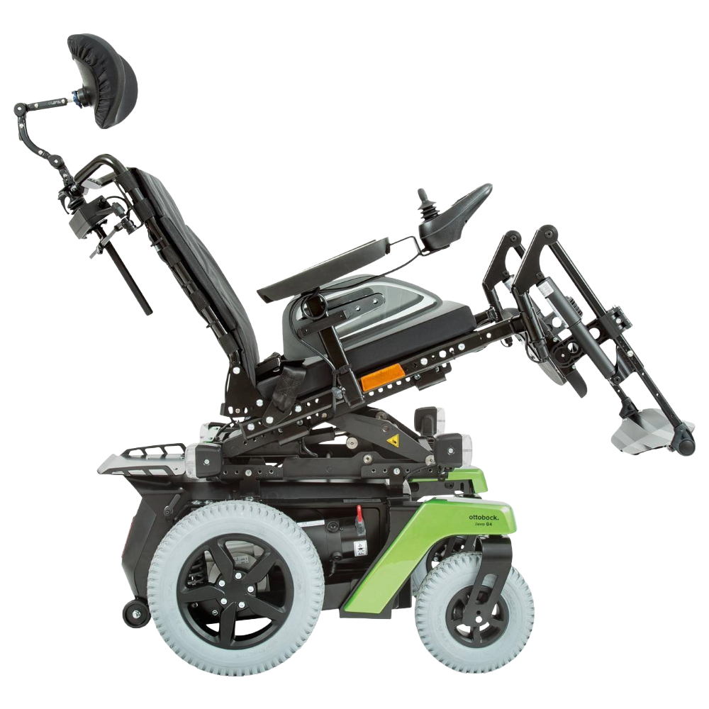 Isolated product view of the Ottobock Juvo B4 RWD powerchair demonstrating its powered seat tilt function. The image shows the seating unit tilted back at an angle (up to 45°) while maintaining stability through center-of-gravity shifting. This feature is designed for pressure redistribution, postural support, and enhanced user comfort, showcasing the chair’s robust black frame and modular seating system, isolated on a white background.