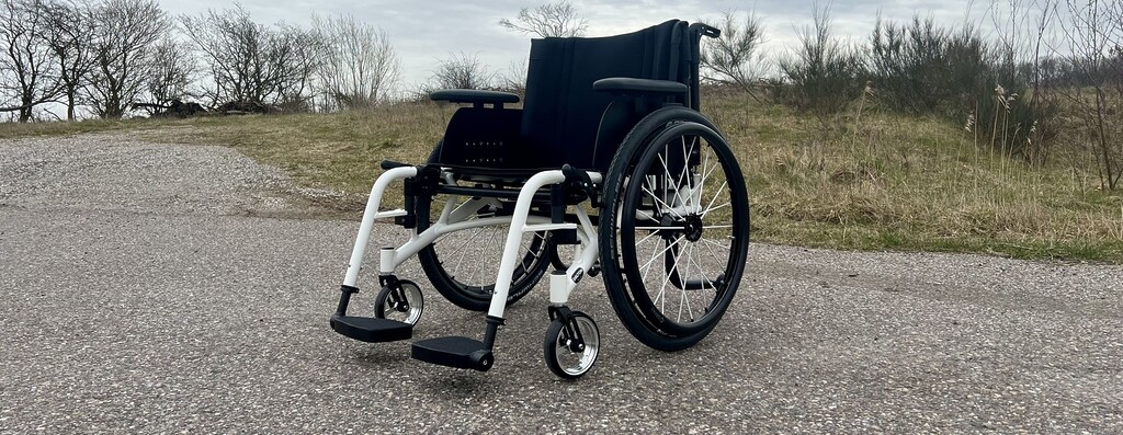 W5 XXL Wolturnus Wheelchair_White Outdoors Banner