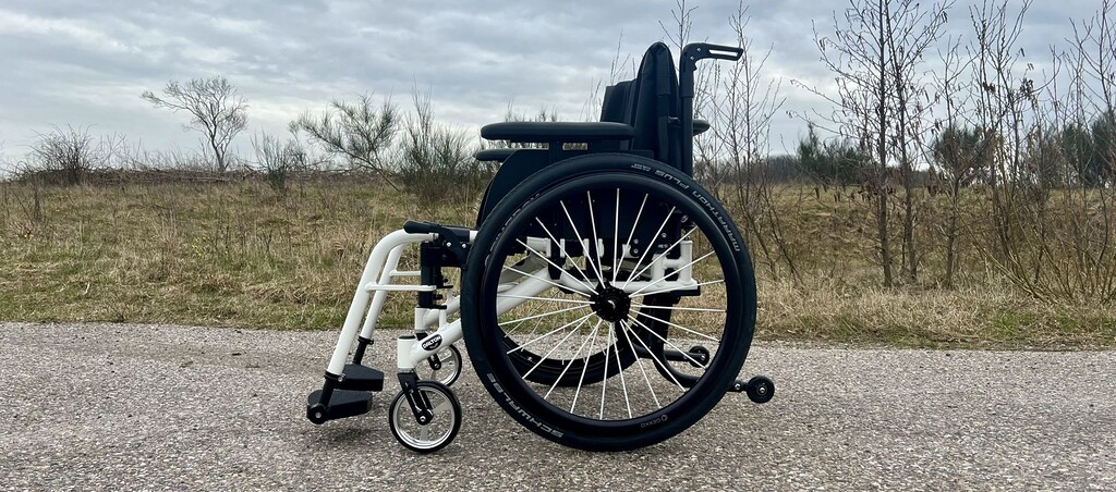 XXL Wolturnus Wheelchair_White Side Outdoors Banner