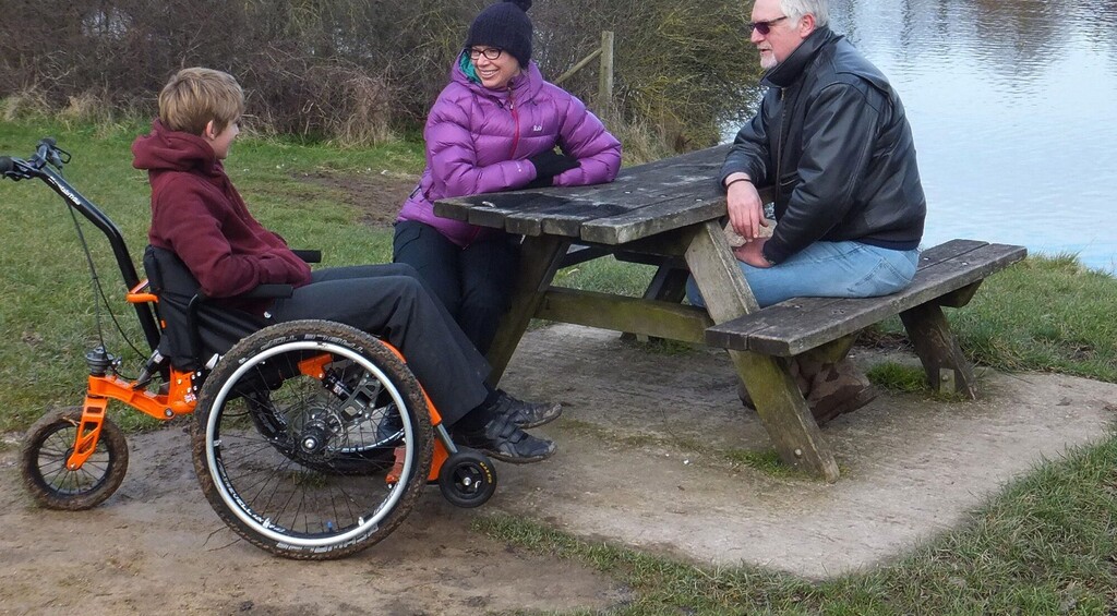 MT Push All-Terrain Attendant Controlled Wheelchair_Boy at the bench