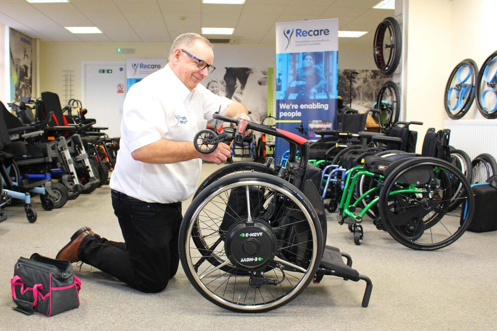 Adjusting a wheelchair setup in the showroom