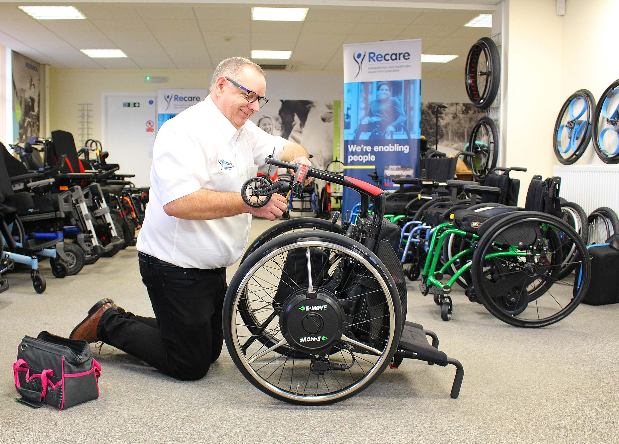 Adjusting a wheelchair setup in the showroom