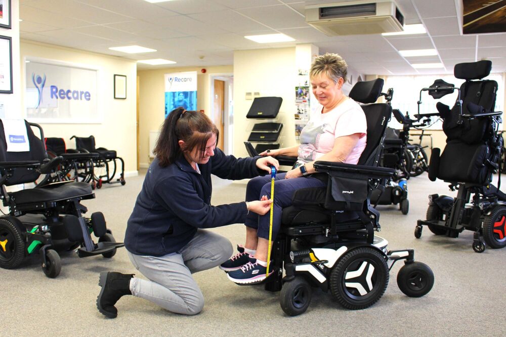 Measuring leg height for a powerchair fitting