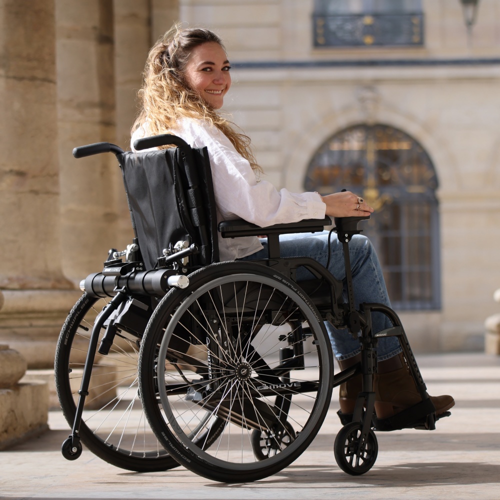 A detailed close-up of the Benoit Systèmes Light Drive 3 joystick controller, showcasing the intuitive interface and speed settings used for precise manual wheelchair navigation.