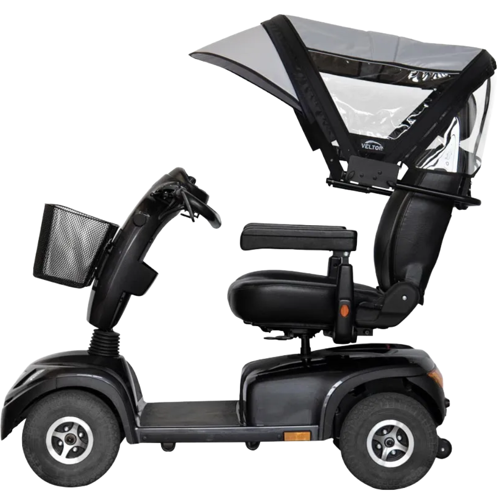 A side-profile view of a black mobility scooter featuring the Veltop Comfort Mobil-A rain protection canopy.